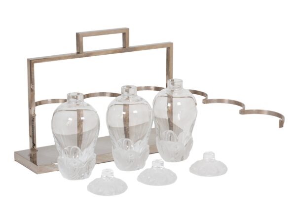 Front overview of the French Lalique Tantalus opened with the decanters and lids removed