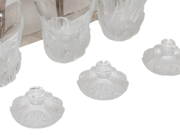 Close up of the decanter lids from the French Lalique Tantalus