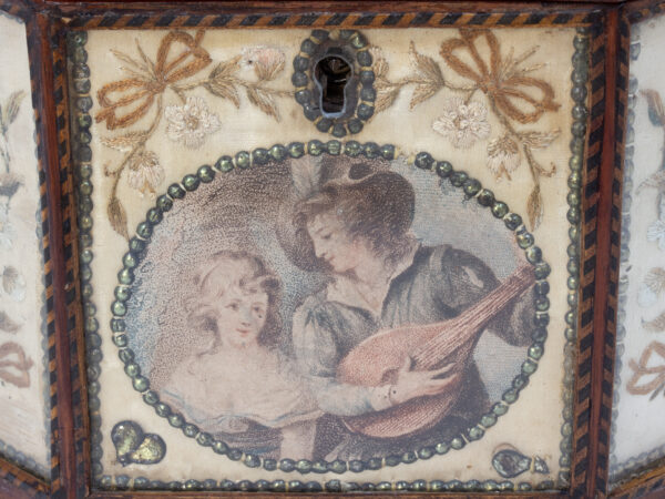 Close up of the front panel on the Georgian Glazed Silk Embroidered Tea Caddy