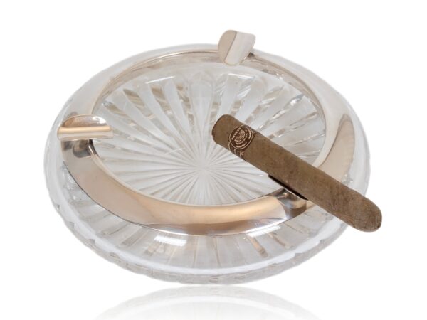 Overview of the Art Deco Silver Mounted Cigar Ash Tray Wilhelm T. Binder with a cigar for scale