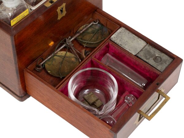 Close up of the drawer contents inside the Antique Victorian Mahogany Apothecary Box