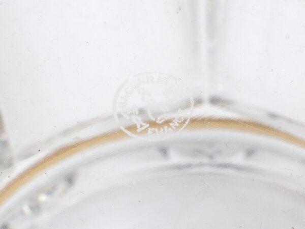 Close up of one of the baccarat logos from base of the Baccarat Gold Crystal Champagne Cooler