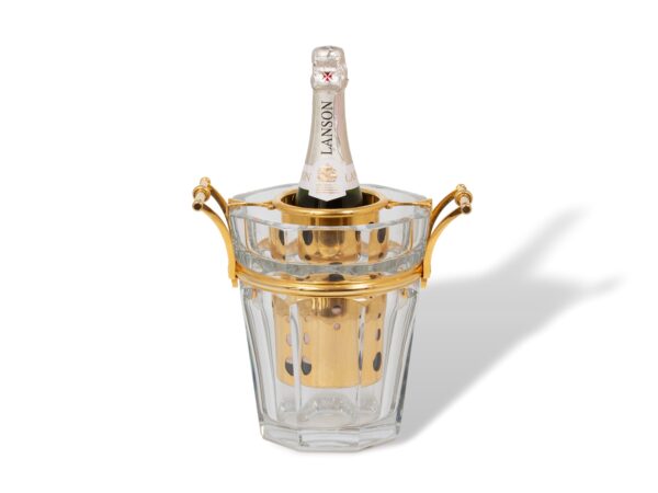 Overview of the Baccarat Gold Crystal Champagne Cooler with a champagne bottle