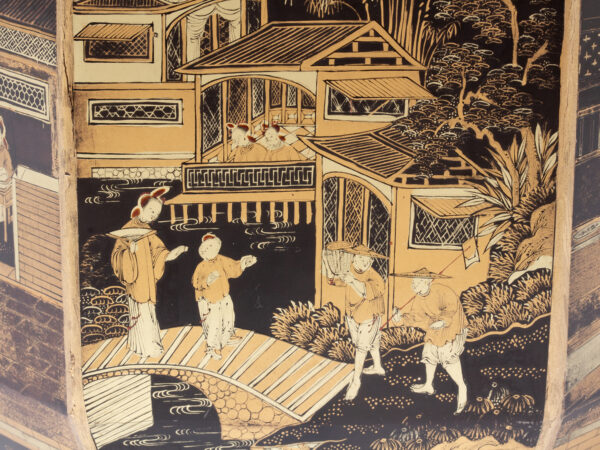 Close up of the decoration on the exterior of the Chinese Export Lacquered Tea Chest