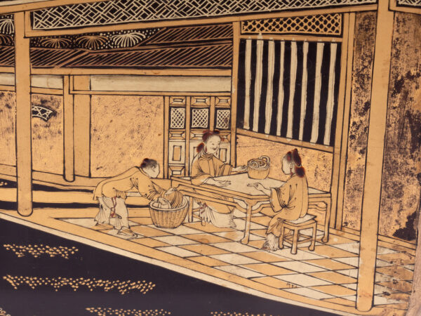 Close up of the decoration on the exterior of the Chinese Export Lacquered Tea Chest