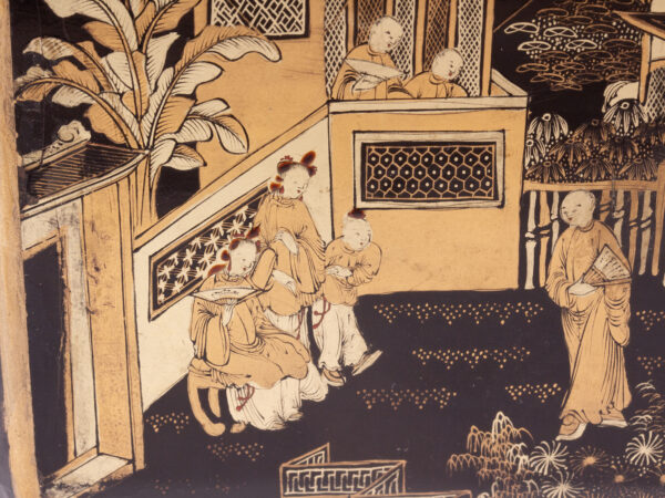 Close up of the decoration on the exterior of the Chinese Export Lacquered Tea Chest