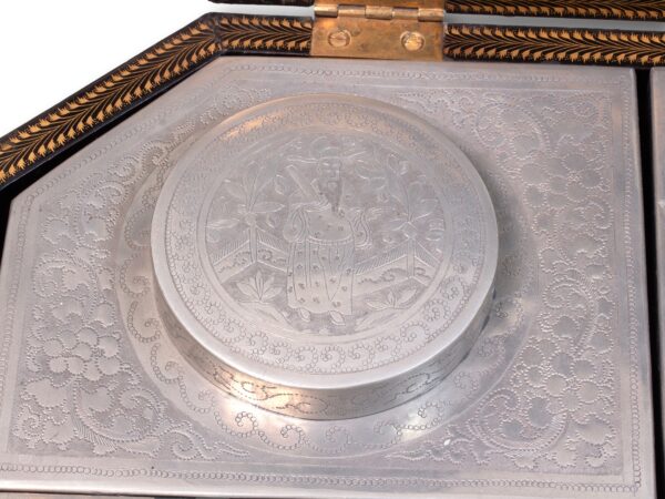 Close up of the tea caddy lids inside the Chinese Export Lacquered Tea Chest