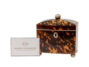 Miniature Bow Fronted Tortoiseshell Tea Caddy next to a standard size business card