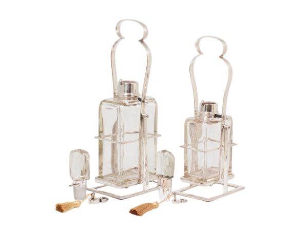 Overview of the Pair of Tilting Decanters Hukin & Heath unlocked with the stoppers removed