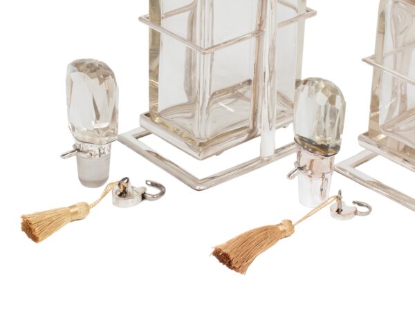 Close up of the stoppers from the Pair of Tilting Decanters Hukin & Heath