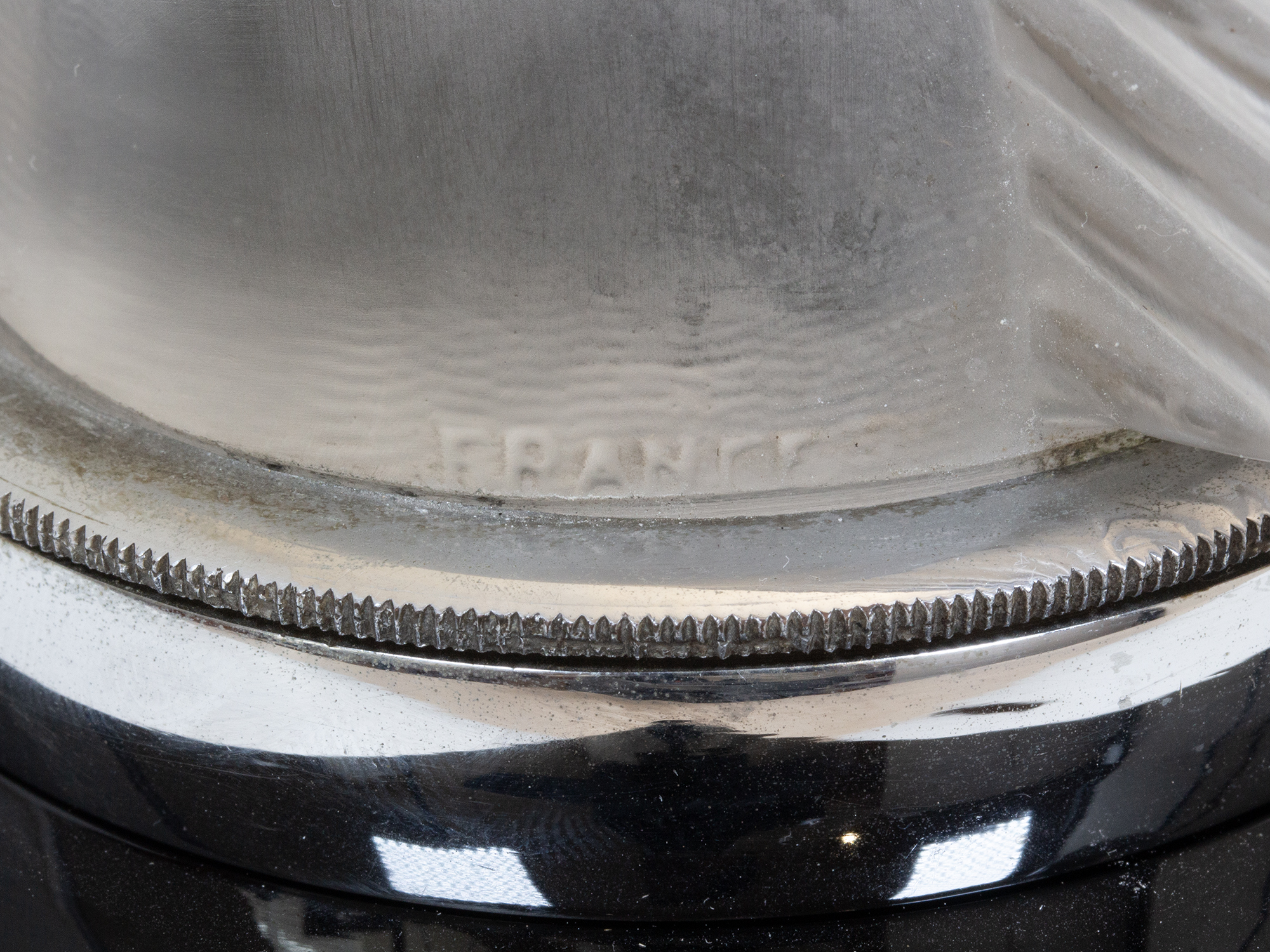 Close up of the rene lalique marks from the Rene Lalique Car Mascot Epsom 1153