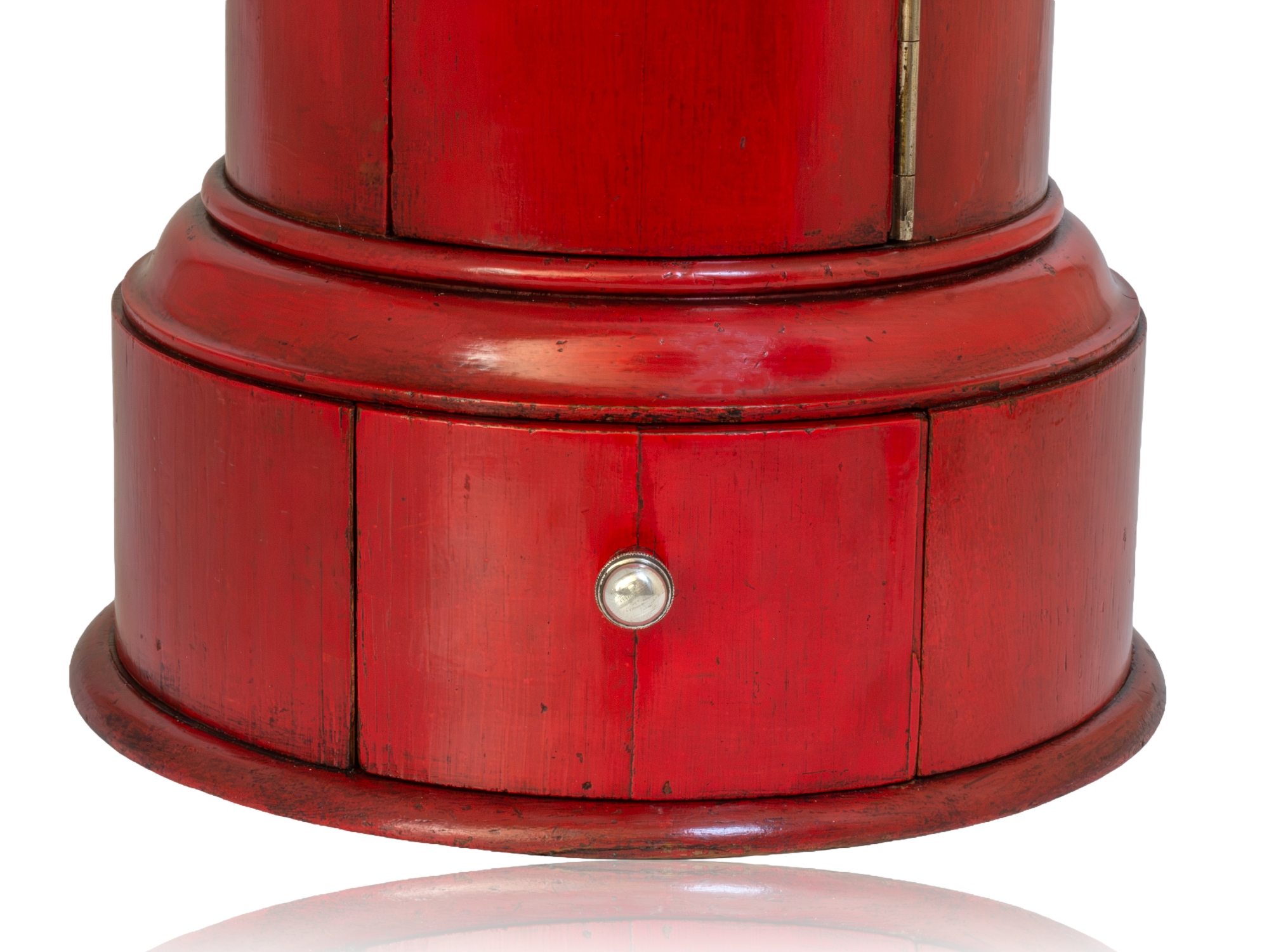 Red post box close up of the base front showing the drawer