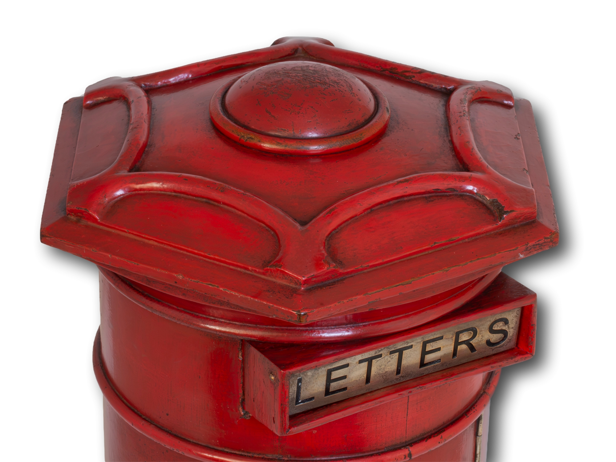 Red post box close up of the top